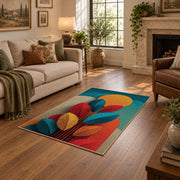 Colorful vintage geometric autumn leaves area rug shown beside a comfortable sofa