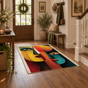 Colorful vintage geometric profile portrait area rug styled in a welcoming entryway