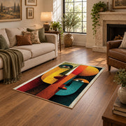 Colorful vintage geometric profile portrait area rug shown beside a comfortable sofa
