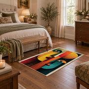 Colorful vintage geometric profile portrait area rug styled in a restful bedroom