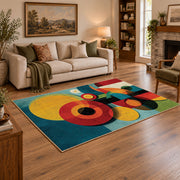 Colorful vintage geometric geometric flowers area rug styled in a warm living room