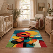 Colorful vintage geometric geometric flowers area rug shown in a calm nursery