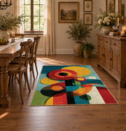 Colorful vintage geometric geometric flowers area rug shown in a bright dining space