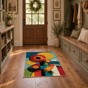 Colorful vintage geometric geometric flowers area rug displayed in a refined hallway