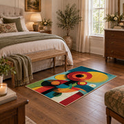 Colorful vintage geometric geometric flowers area rug styled in a restful bedroom
