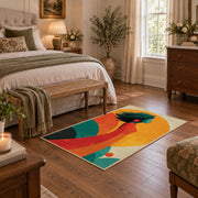 Colorful vintage geometric tree landscape area rug styled in a restful bedroom