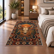 Desert Sunset Skull Rug shown beside a bed with neutral bedding