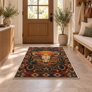 Desert Sunset Skull Rug shown in an entryway near a wooden door