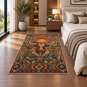 Longhorn Sunset Floral Rug shown beside a bed with neutral bedding