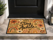 Suupia Stay Awhile doormat with boho flowers and rainbows, styled view 1