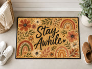 Suupia Stay Awhile doormat with boho flowers and rainbows, styled view 5
